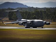 A U.S. Air Force C-17A Globemaster III taxis back to Royal Australian Air Force Base Amberley, Australia, after completing the airborne insertion with the RAAF and U.S. Army to the Shoalwater Bay Training Area, Australia, July 8, 2015. (Royal Australian Air Force photo by Cpl. Shannon McCarthy/Released)