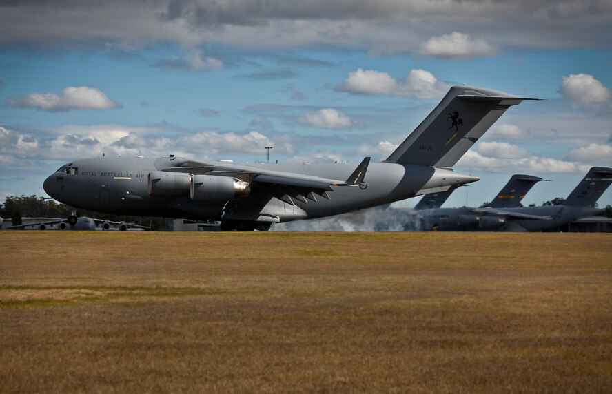 A Royal Australian Air Force No. 36 Squadron C-17A Globemaster III taxis at RAAF Base Amberley after completing the airborne insertion to the Shoalwater Bay Training Area, Queensland, July 8, 2015. (Royal Australian Air Force photo by Cpl. Shannon McCarthy/Released)