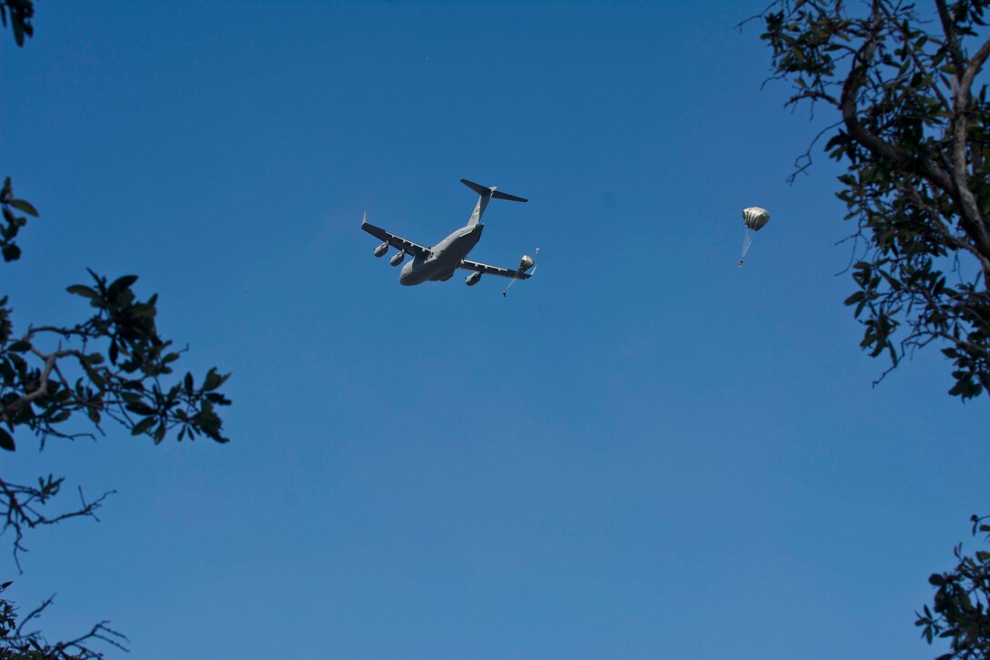 Alaska-based paratroopers from the 3rd Battalion, 509th Infantry, 4th Brigade Combat Team (Airborne), 25th Infantry Division parachute onto Kapyong Drop Zone in Shoalwater Bay Training Area, Australia as part of Exercise Talisman Sabre 15, July 8, 2015. Talisman Sabre is a biennial exercise that provides an invaluable opportunity for nearly 30,000 U.S. and Australian defense forces to conduct operations in a combined, joint and interagency environment that will increase both countries’ ability to plan and execute a full range of operations from combat missions to humanitarian assistance efforts. (U.S. Army photo by Staff Sgt. Daniel Love/Released)
