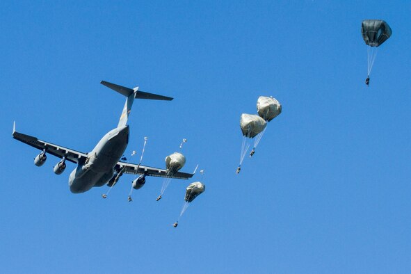 U.S. paratroopers from 4th Brigade Combat Team, 25th Infantry Division parachute from a Boeing C-17 Globemaster III at the Kapyong Air Field, Australia in support of Talisman Sabre 15 July 9. Talisman Sabre is a biennial exercise that provides an invaluable opportunity for nearly 30,000 U.S. and Australian defense forces to conduct operations in a combined, joint and interagency environment that will increase both countries’ ability to plan and execute a full range of operations from combat missions to humanitarian assistance efforts.(U.S. Army photo by Sgt. David N. Beckstrom/Released)