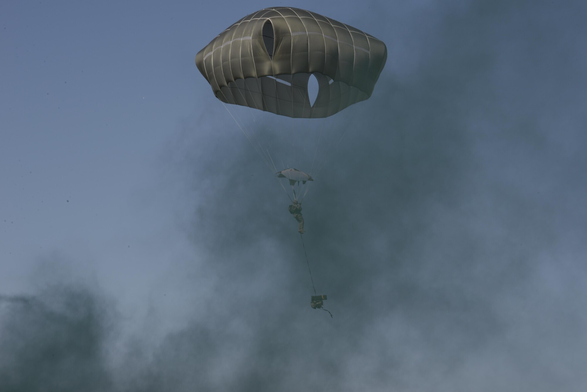 A jumper from the U.S. Army 4th Battalion, 25th Infantry Airborne floats down after jumping from a C-17 Globemaster III aircraft during exercise Talisman Sabre in Northern Territory, Australia, July 8, 2015. Exercises such as Talisman Sabre offer a uniquely complex and challenging multinational environment for our forces to hone their skills. (U.S. Air Force photo by Senior Airman Stephen G. Eigel)