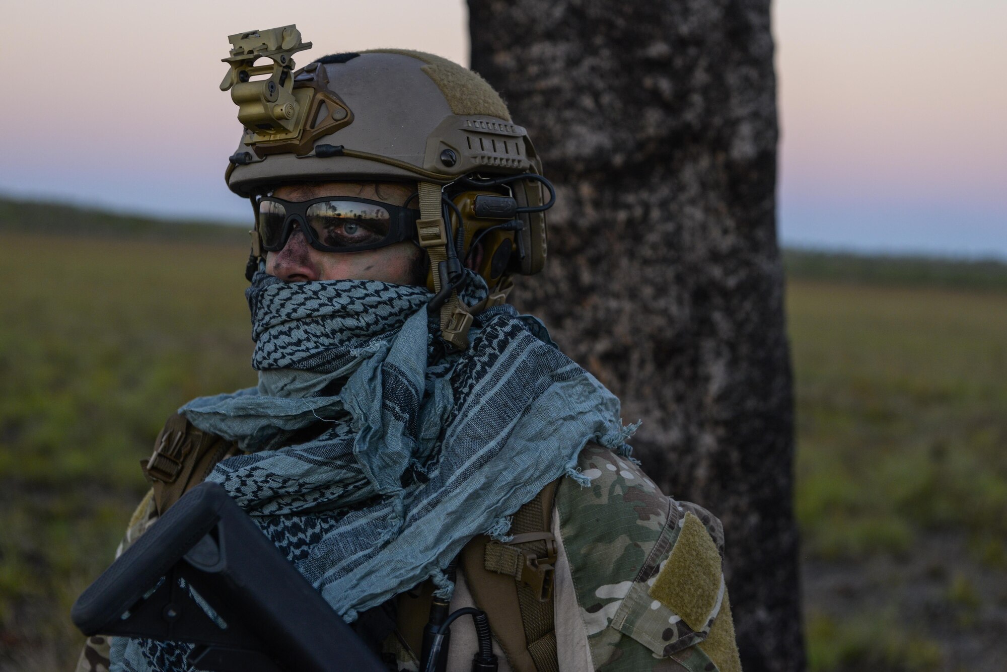 A special tactics combat controller from the 320th Special Tactics Squadron waits for the rest of his team to arrive after performing a high altitude low opening jump during exercise Talisman Sabre in Northern Territory, Australia, July 10, 2015. Credible, ready maritime forces help to preserve peace and prevent conflict. Talisman Sabre participants have the opportunity to further enhance their ability to respond to crises as part of a joint or combined effort. (U.S. Air Force photo by Senior Airman Stephen G. Eigel)