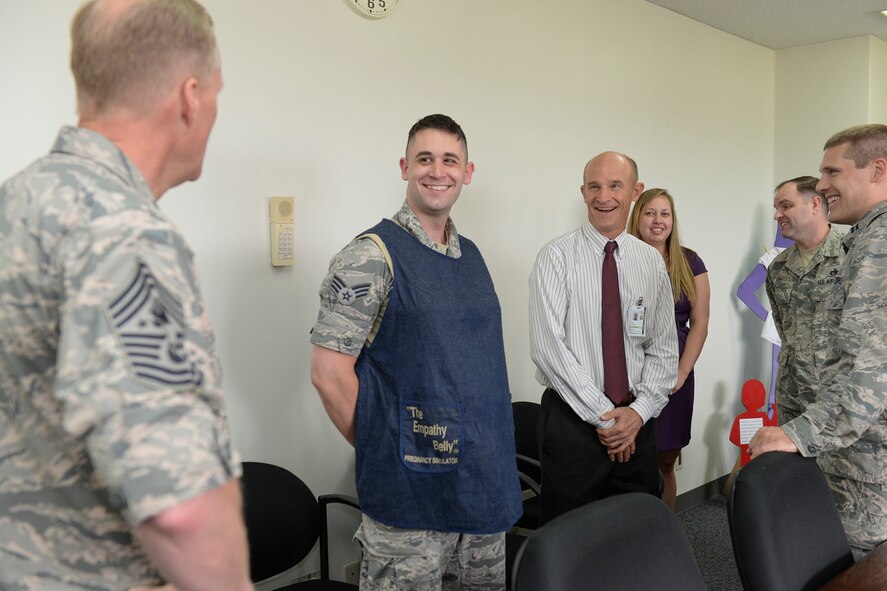 Chief Master Sgt. of the Air Force James A. Cody meets with personnel at the Mental Health department of the374th Medical Operations Squadron at Yokota Air Base, Japan, July 10, 2015. Cody spent time observing the department, listening to the staff, and discussing strengths and possible improvements. (U.S. Air Force photo by Airman 1st Class Elizabeth Baker/Released) 