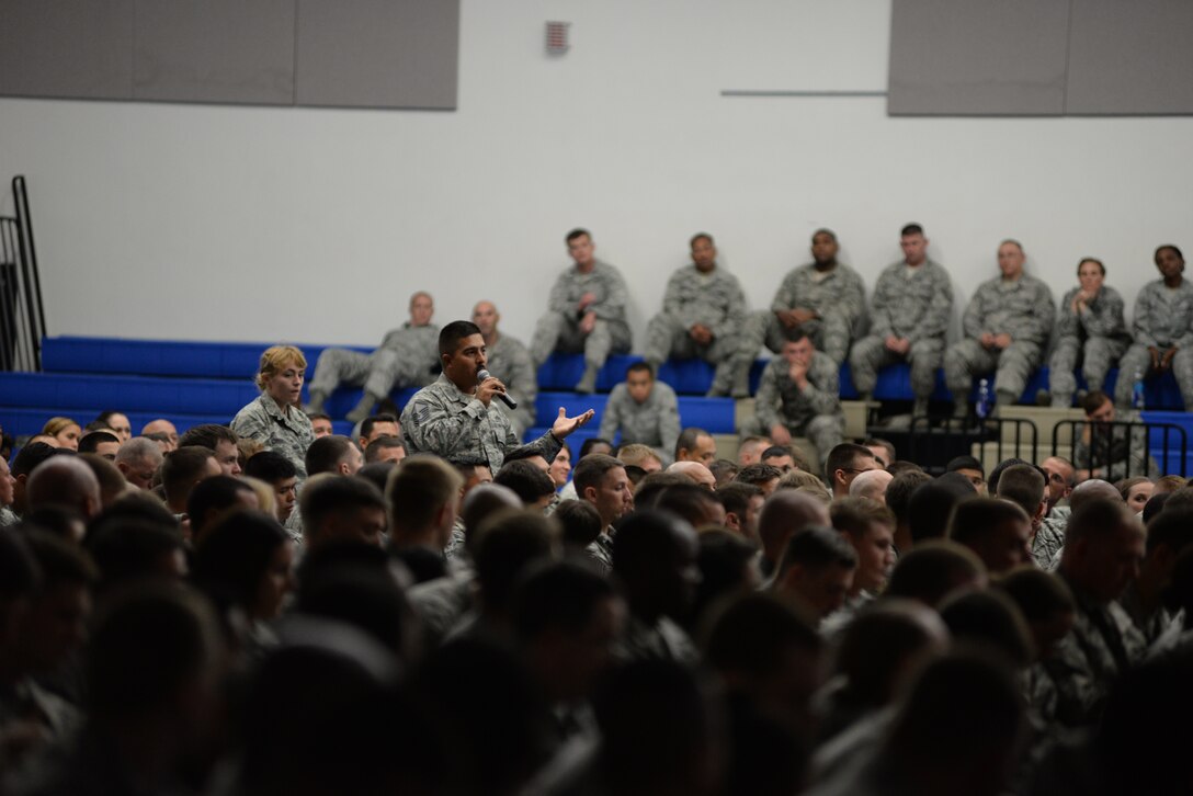 Chief Master Sgt. Harold Hutchinson, Pacific Air Forces command chief, addresses audience members during an all-call July 13, 2015, at Andersen Air Force Base, Guam.  Airmen attended the all-call to learn more about fundamental changes to the enlisted evaluation system. (U.S. Air Force photo by Senior Airman Alexander W. Riedel/Released)