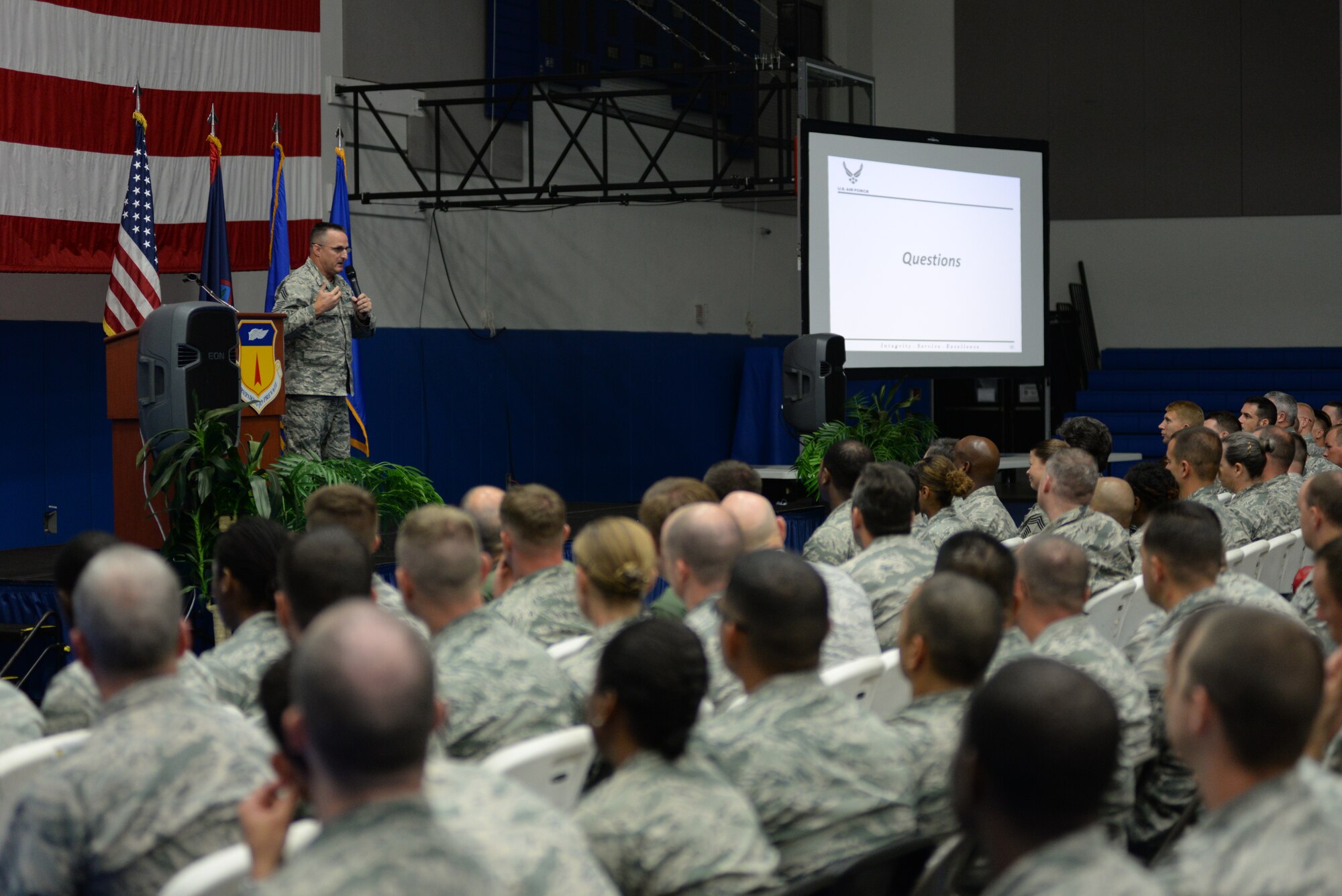 Chief Master Sgt. Harold Hutchinson, Pacific Air Forces command chief, addresses audience members during an all-call July 13, 2015, at Andersen Air Force Base, Guam.  Airmen attended the all-call to learn more about fundamental changes to the enlisted evaluation system. (U.S. Air Force photo by Senior Airman Alexander W. Riedel/Released)