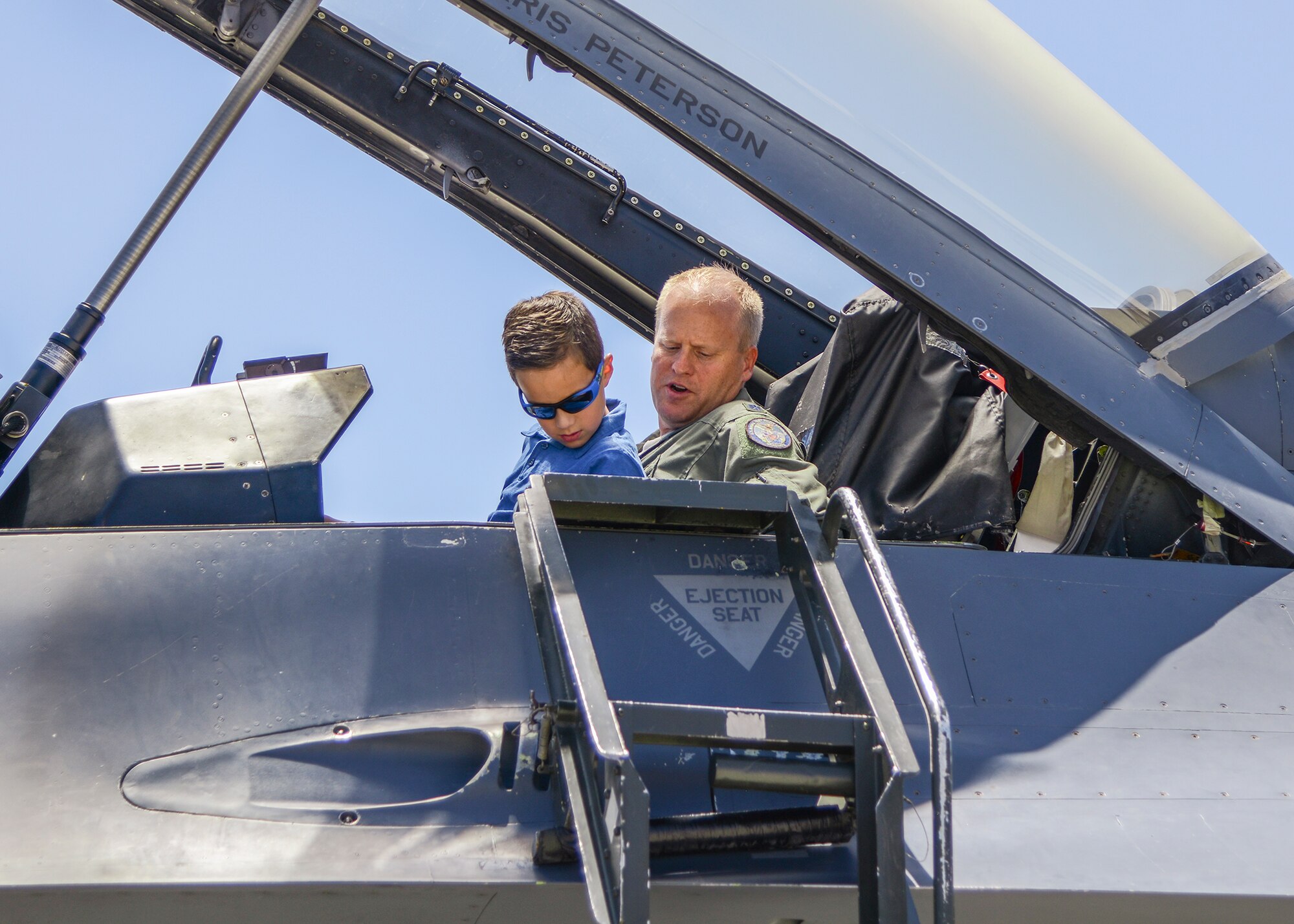 Lt. Col. Darren Wees, 416th Flight Test Squadron commander, gave eight-year-old future Airman Vincent a day to remember showing him the back seat of the F-16 Fighting Falcon. (U.S. Air Force photo by Rebecca Amber)