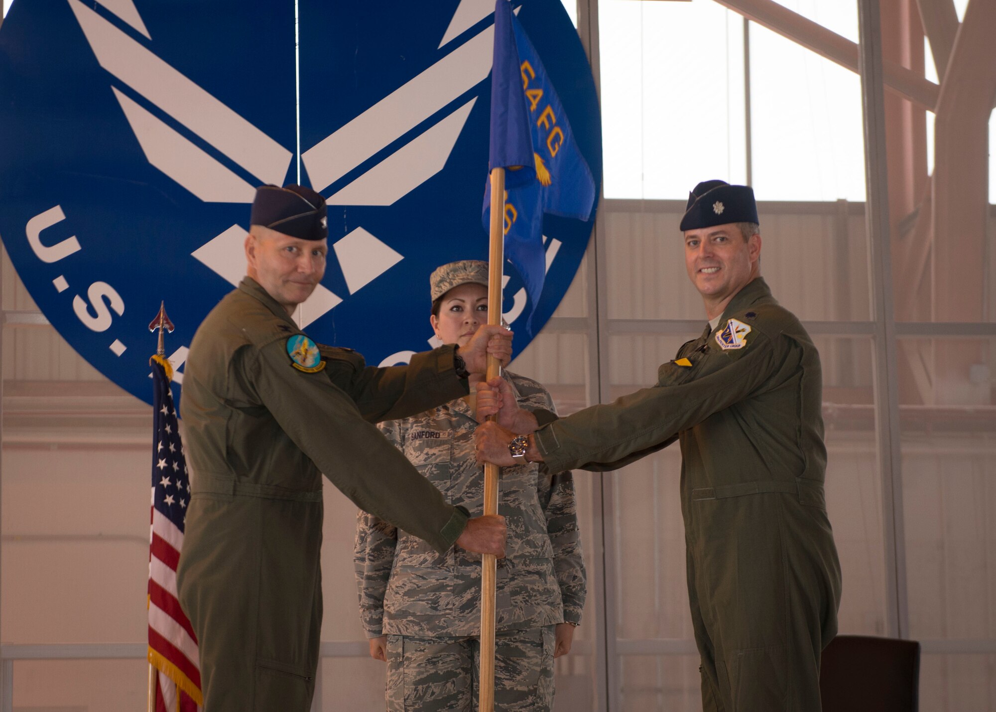 Lt. Col. Andrew Caggiano, 314th Fighter Squadron commander, accepts the 314th FS guidon from Col. Jeffrey Jenssen, 54th Fighter Group commander as part of the 314th FS activation ceremony at Holloman Air Force Base, N.M., on July 14. Caggiano graduated with military distinction from the United States Air Force Academy in 1997. He earned his pilot wings at Euro-NATO Joint Jet pilot Training in 1999 at Sheppard Air Force Base, Texas. He is a command pilot with over 1,850 hours in the F-16 Fighting Falcon. The mission of the 314th FS is to produce the world’s greatest F-16 Fighting Falcon pilots and deploy combat mission-ready Airmen to units worldwide. (U.S. Air Force photo by Senior Airman Aaron Montoya)