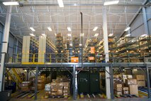 U.S. Air Force Airman 1st Class Cody Masterson, 23d Logistics Readiness Squadron material management apprentice, retrieves an item for a customer in the warehouse 17 parts store, July 13, 2015, at Moody Air Force Base, Ga. The 23d LRS parts store personnel are responsible for thousands of Moody’s aircraft parts. (U.S. Air Force photo by Airman Greg Nash/Released)