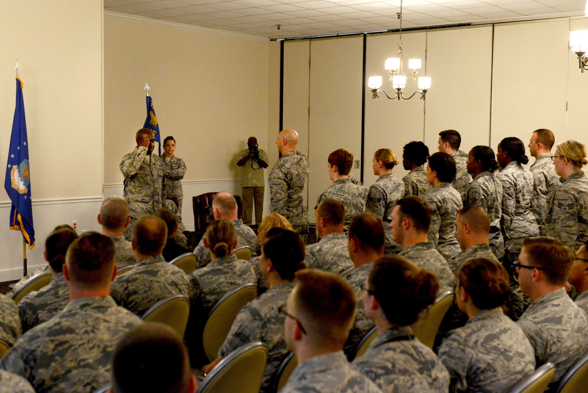 U.S. Air Force Lt. Col. Ryan O’Neal, 51st Intelligence Squadron commander, renders his first salute to the 51st IS Airmen during an assumption of command ceremony at Shaw Air Force Base, S.C., July 10, 2015. The 51st IS is the Air Force’s lead analytical and targeting organization for support to the U.S. Air Forces Central Command commander. (U.S. Air Force photo by Senior Airman Diana M. Cossaboom/Released)
