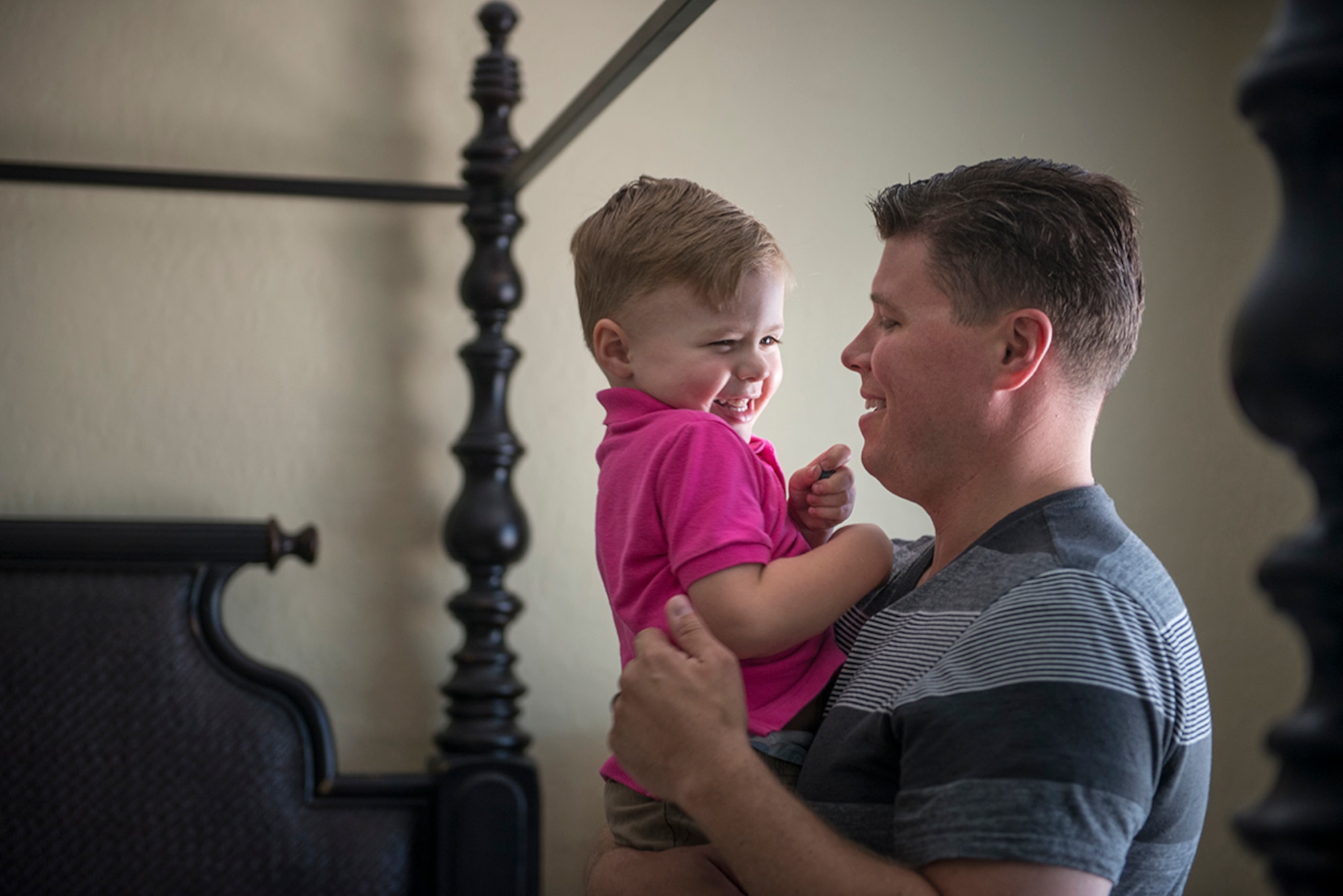 Maj. Jeremy, a 432nd Air Expeditionary Wing MQ-9 Reaper pilot, enjoys some play time with his son. Jeremy values the quality time with his children even more because of his demanding work schedule. While working the swing shift, Jeremy found it hard to get in quality time with his children because of the conflicting schedules. (U.S. Air Force photo by Staff Sgt. Vernon Young Jr.)