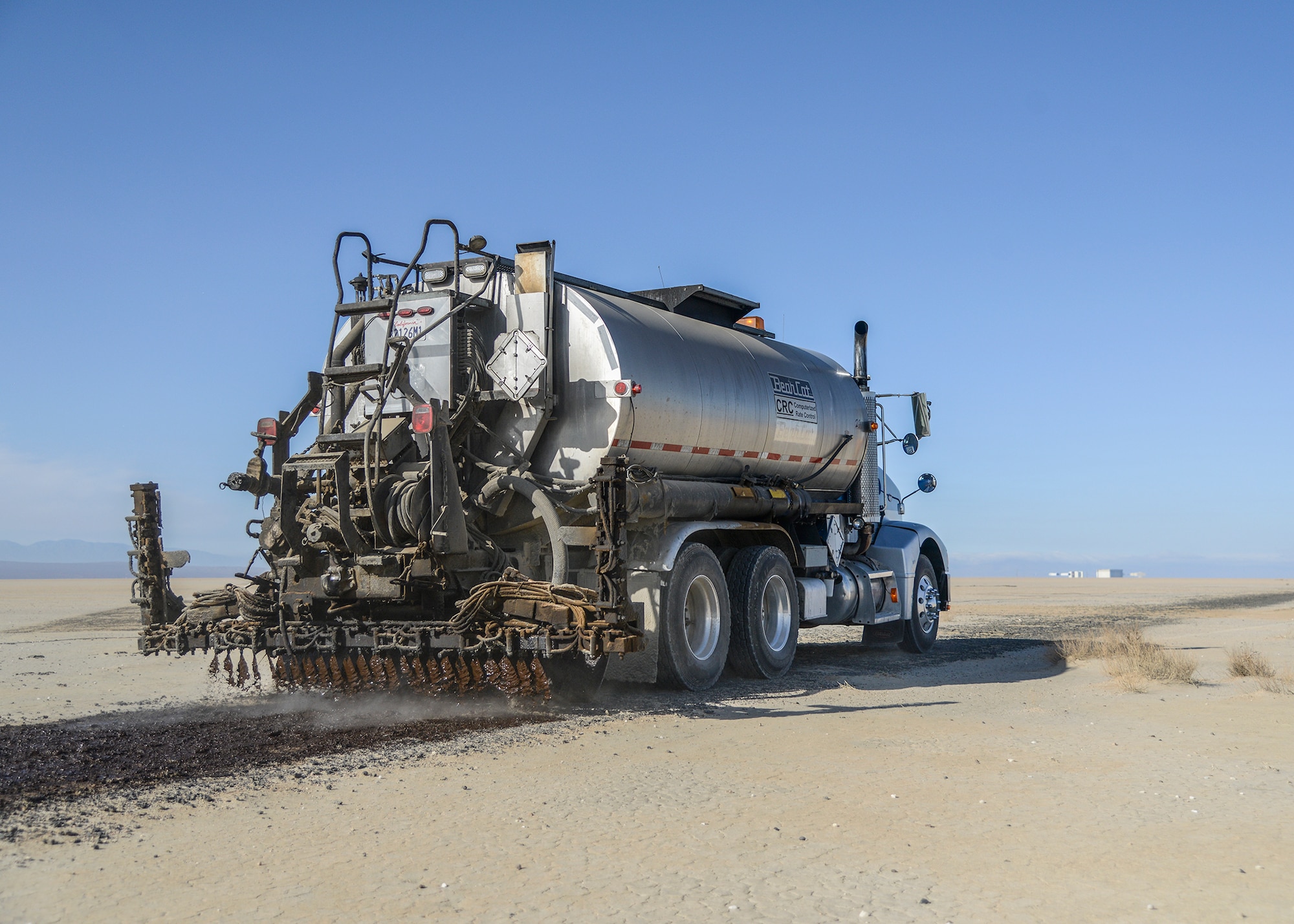 Oil spreader trucks can hold up to 5,000 gallons of SSH1. (U.S. Air Force photo by Rebecca Amber)
