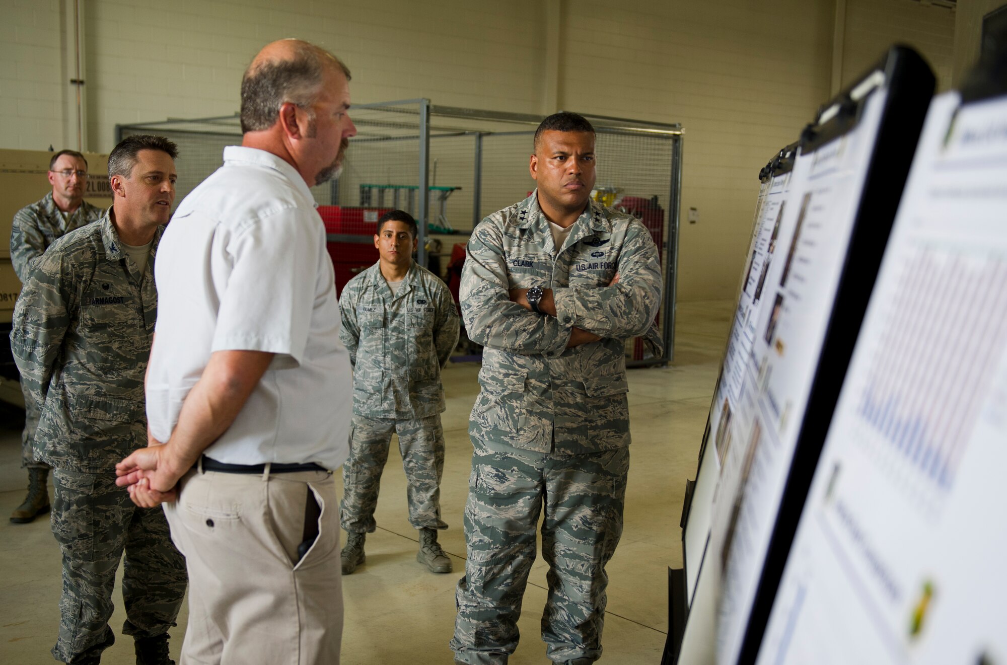 Maj. Gen. Richard Clark, Eighth Air Force commander, is updated by members of the 5th Logistics Readiness Squadron at Minot Air Force Base, N.D., July 13, 2015. Clark was briefed on accomplishments, innovations and goals made by the 5th LRS. (U.S. Air Force photo/Justin T. Armstrong) 