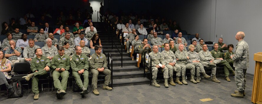 U.S. Air Force Lt. Col. Jonathan Downing from the KC-46 Systems Program Office speaks to audience members during the KC-46 Site Activation Task Force visit at Pease Air National Guard Base, N.H., July 14, 2015.  Subject matter experts from the National Guard Bureau, Air Mobility Command, Boeing, Flight Safety, McConnell Air Force Base and Altus AFB are on hand to help field the KC-46 at Pease. (N.H. Air National Guard photo by Staff Sgt. Curtis J. Lenz)