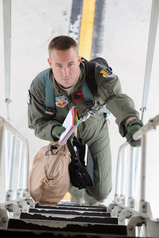 Capt. Brandon Packard, 37th Bomb Squadron weapons systems officer, climbs into a B-1 bomber at Ellsworth Air Force Base, S.D., June 30, 2015 prior to flying it to Tinker Air Force Base, Okla., to receive Integrated Battle Station systems upgrades. Ellsworth sent its first B-1 to Tinker for the upgrade to help modernize the aircraft by making it more user friendly for B-1 pilots and maintainers. (U.S. Air Force photo by Airman Sadie Colbert/Released)