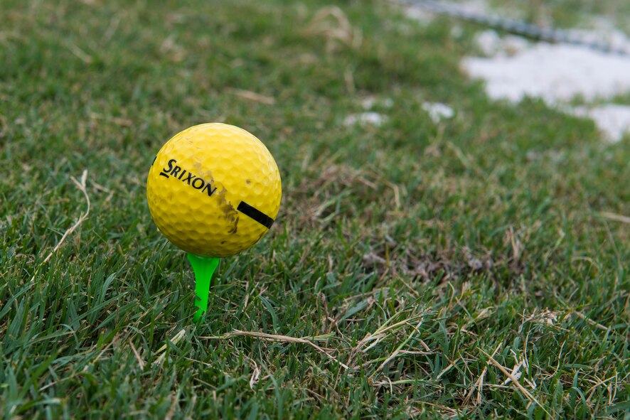 A golf ball rests on a tee at the Quiet Pines Golf Course driving range during the QP Summer Golf League July 9, 2015, at Moody Air Force, Ga. The course holds the Summer Golf League yearly in June and July. (U.S. Air Force photo by Airman 1st Class Kathleen D. Bryant/Released)

