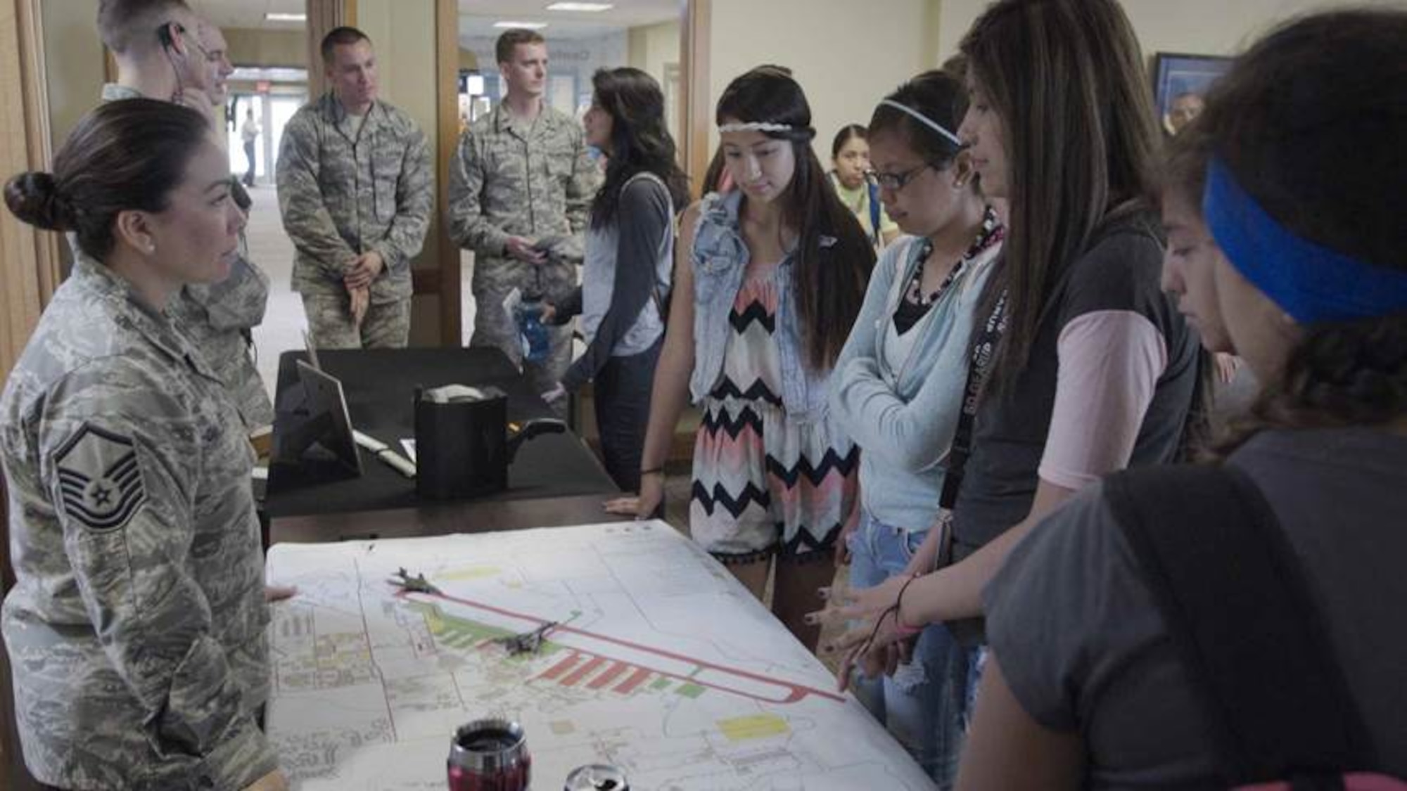 Students from the South Dakota GEAR UP summer program learn about airfield operations at a Native American Outreach career day event at the South Dakota School of Mines and Technology in Rapid City, S.D., July 7, 2015. SD GEAR UP stands for Gaining Early Awareness and Readiness for Undergraduate Program, and its primary purpose is to increase the number of first-generation low-income Native American students who are prepared to enter and succeed in post-secondary education. (Courtesy photo/Released)