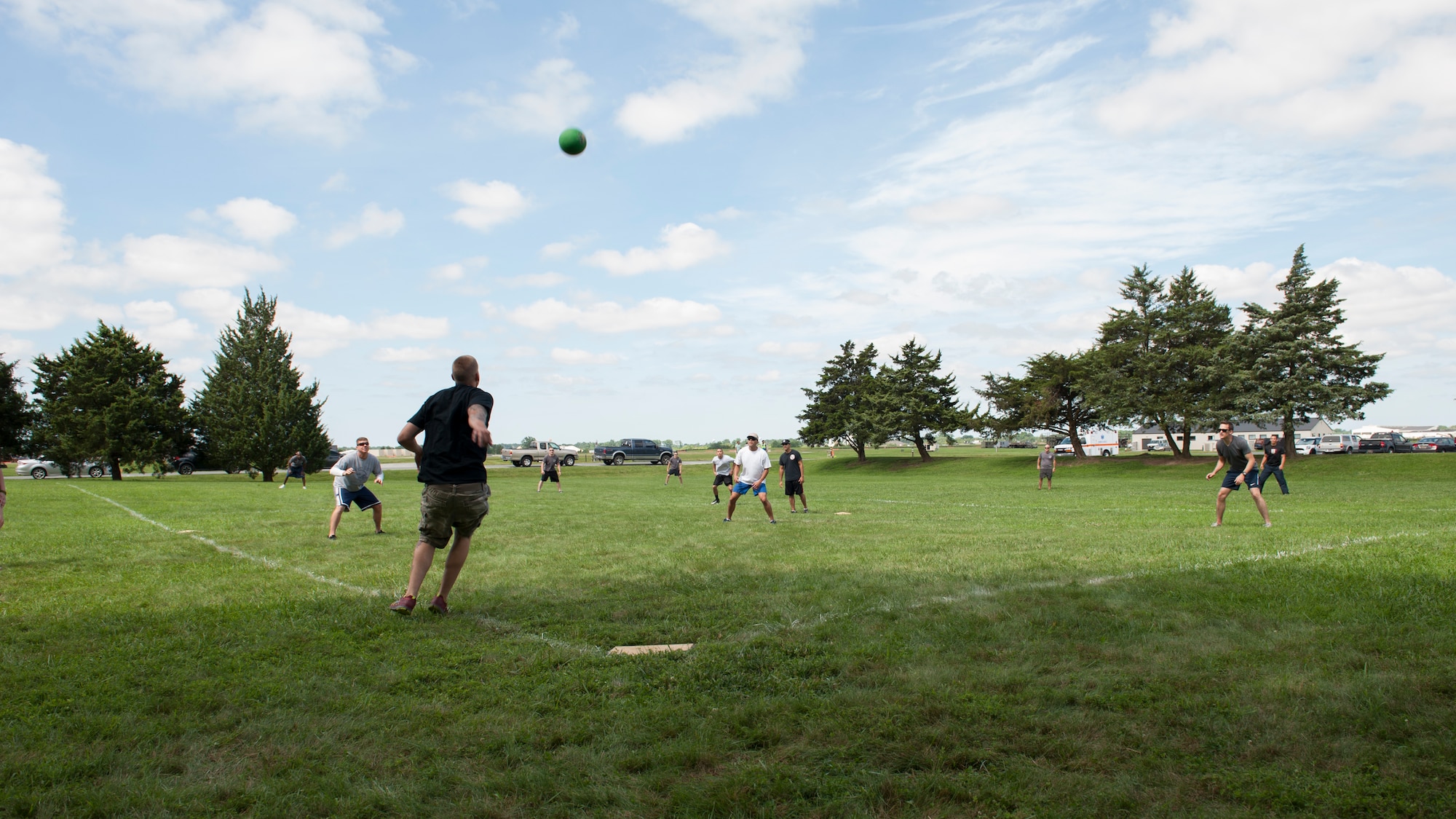 Airman 1st Class Luke Parker, 436th Maintenance Squadron aircraft structural maintenance, kicks a kickball into the outfield during a game at the 436th Airlift Wing’s Wingman Day picnic July 10, 2015, at Eagle’s Nest Park on Dover Air Force Base, Del. Sporting events including kickball, flag football, cornhole, volleyball and tug-of-war took place. (U.S. Air Force photo/Airman 1st Class Zachary Cacicia) 