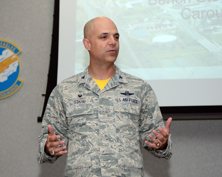 U.S. Air Force Col. Michael Bob Starr, 7th Bomb Wing commander, speaks at the 2015 Big Country Innovation Challenge June 26, 2015, at Dyess Air Force Base, Texas. Team Dyess held its first competition to promote new ideas or concepts to improve operations at the base and across the Air Force. The competition challenged Airmen to present their content in an open forum in return for wing leadership support and funding for their ideas (U.S. Air Force photo by Senior Airman Kedesha Pennant/Released)