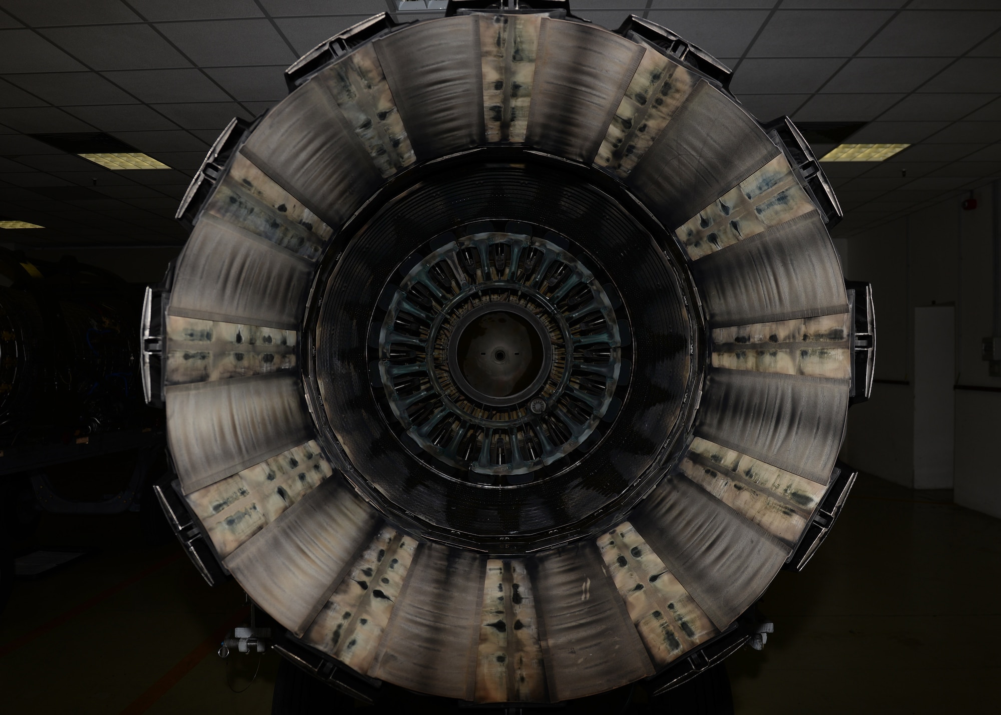 A repaired F-16 Fighting Falcon engine sits inside the 31st Maintenance Squadron engine propulsion shop, June 24, 2015, at Aviano Air Base, Italy. Airmen with 31 MXS propulsion shop ensure jet engines are serviceable and  ready to fly. (U.S. Air Force photo by Airman 1st Class Cary Smith/Released)