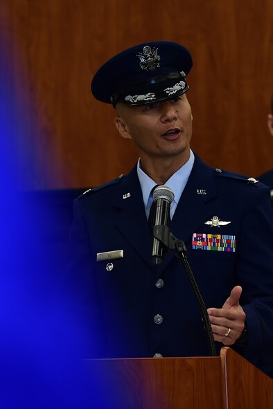Col. Young Yu, 423rd Air Base Group commander, addresses Airmen from the 501st Combat Support Wing during a change of command ceremony at RAF Molesworth, United Kingdom, July 14, 2015. (U.S. Air Force photo by Tech. Sgt. Chrissy Best/Released)