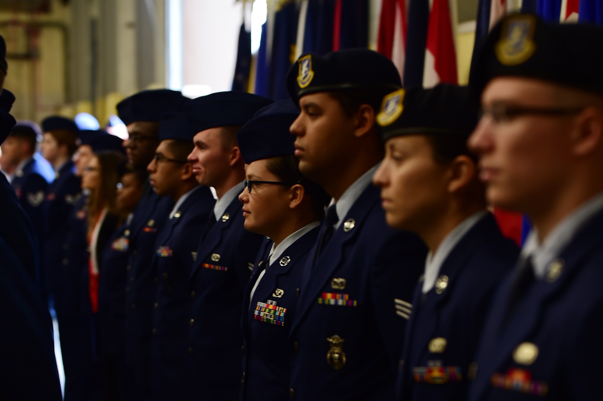 Airmen from the 501st Combat Support Wing stand in formation during the 423rd Air Base Group change of command ceremony at RAF Molesworth, United Kingdom, July 14, 2015.  Col. Young Yu, accepted command of the 423rd ABG from Col. Steven Sweeney during the ceremony.  (U.S. Air Force photo by Tech. Sgt. Chrissy Best/Released)