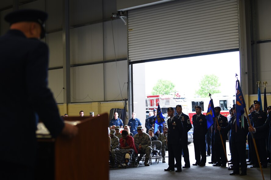 Col. Steven Sweeney, 423rd Air Base Group commander, addresses 501st Combat Support Wing Airmen for the last time during a change of command ceremony at RAF Molesworth, United Kingdom, July 14, 2015. After two years as commander, Sweeney turned the group over to Col. Young Yu. (U.S. Air Force photo by Staff Sgt. Jarad A. Denton/Released)