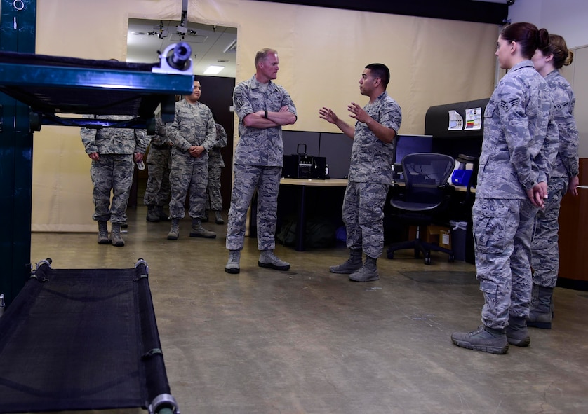 Chief Master Sgt. of the Air Force James Cody speaks with U.S. Air Force Staff Sgt. Javier Amaya, 35th Medical Operations Squadron aerospace medical craftsman, at Misawa Air Base, Japan, July 13, 2015. As part of Cody’s first visit to Misawa, he met with Airmen and learned about their everyday mission and duties. (U.S. Air Force photo by Airman 1st Class Jordyn Fetter/Released)