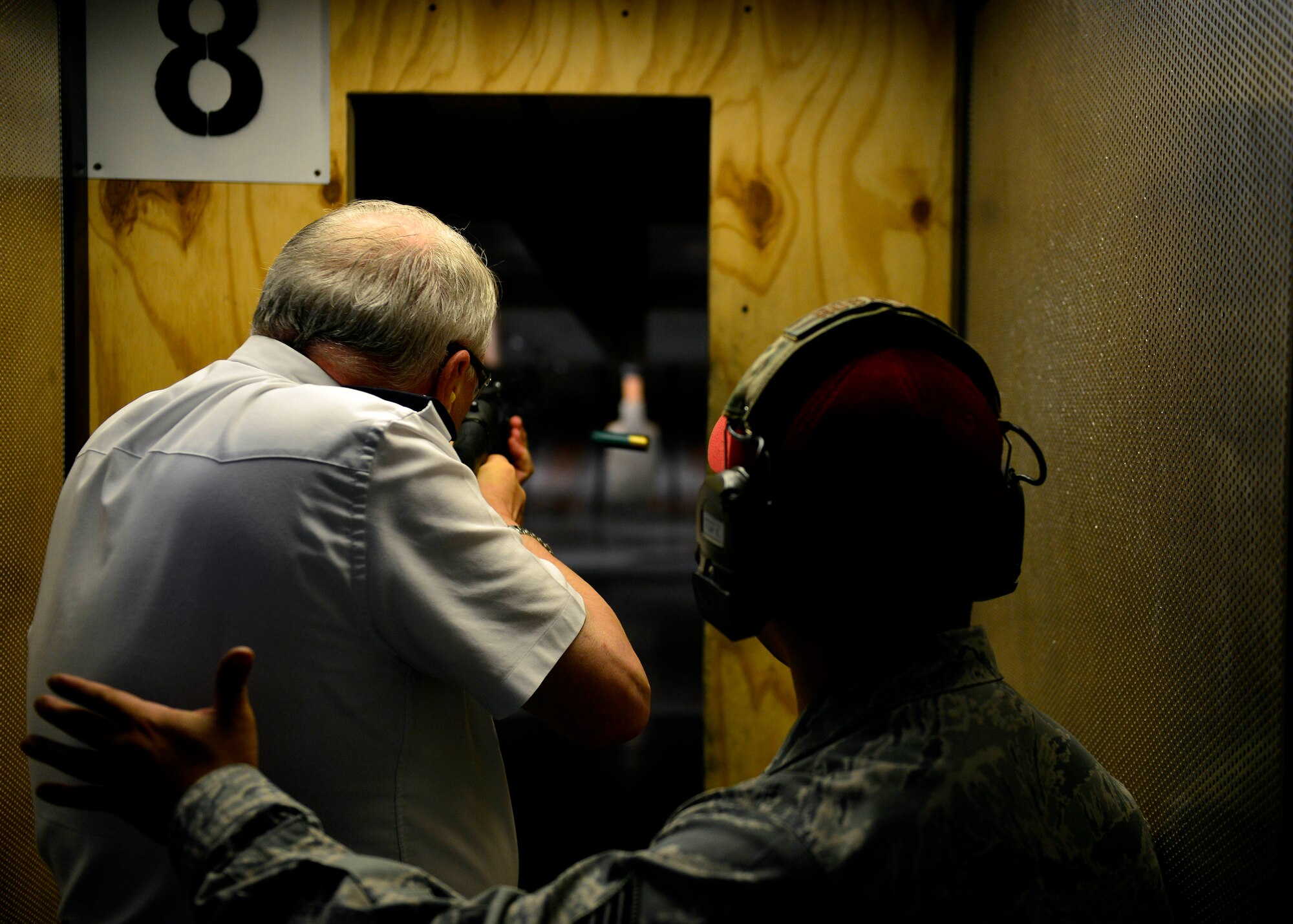 A Pordenone Polizia Locale officer shoots an M870 shotgun at the combat arms training and maintenance range, July 10, 2015, at Aviano Air Base, Italy. This was the first time the Pordenone Polizia Locale trained with Security Forces Airmen on base. (U.S. Air Force photo by Airman 1st Class Cary Smith/Released)