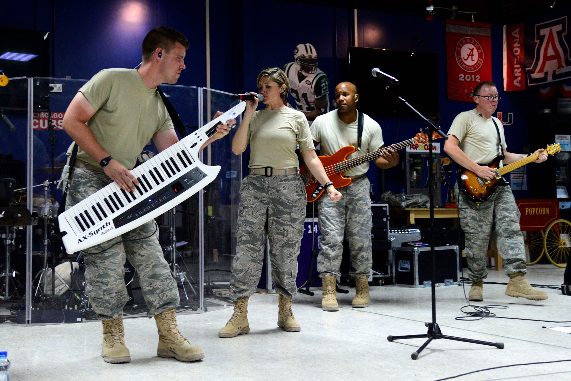 The Air Forces Central Command band performs for Service members at an undisclosed location in Southwest Asia, July 6, 2015. The band utilized music as a form of communication to boost morale. (U.S. Air Force photo by Senior Airman Racheal E. Watson/Released)