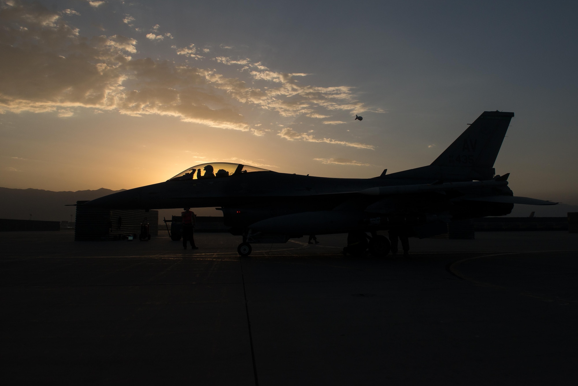 U.S. Airmen from the 455th Expeditionary Aircraft Maintenance Squadron’s weapons flight prepare to complete a final check of the weapons on an F-16 Fighting Falcon aircraft before it takes off on a combat sortie from Bagram Airfield, Afghanistan, July 14, 2015. The F-16 is a multi-role fighter aircraft that is highly maneuverable and has proven itself in air-to-air and air-to-ground combat. Members of the Triple Nickel are deployed in support of Operation Freedom’s Sentinel and NATO’s Resolute Support mission. (U.S. Air Force photo by Tech. Sgt. Joseph Swafford/Released)