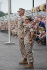 Col. Harold Van Opdorp, left, relinquishes command to Col. Julie Nethercot at Officer Candidate School, July 8, at Brown Field, aboard Marine Corps Base Quantico.