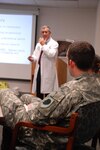 Jim Young, a doctor at Rush Medical Center University, teaches a class about traumatic brain injuries and head trauma to service members of the Advance Trauma Training Program at Rush University.