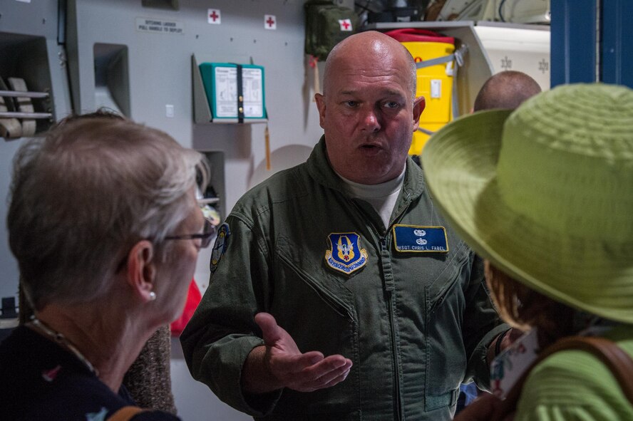 Master Sgt. Chris Fabel talks with visitors at Royal Naval Air Station Yeovilton International Air Day July 11, 2015. Recognized for “Best Static Display” at the air show, Airmen from the 315th Airlift Wing at Joint Base Charleston, S.C. delivered military pride, strength and technology with a C-17 and gave tours of the aircraft to more than 2,000 people. The air show marked 75 years of existence for RNAS Yeovilton and provided the 315th AW an international stage to showcase its Airmen, aircraft and partnership with the United Kingdom. Fabel is a flying crew chief with the 315th Aircraft Maintenance Squadron. (U.S. Air Force photo by Tech. Sgt. Shane Ellis)