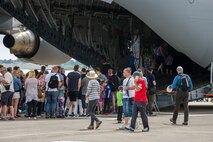 Air-show visitors wait in line to get a tour of the Charleston based C-17 at Royal Naval Air Station Yeovilton International Air Day July 11, 2015. Recognized for “Best Static Display” at the air show, Airmen from the 315th Airlift Wing at Joint Base Charleston, S.C. delivered military pride, strength and technology with a C-17 and gave tours of the aircraft to more than 2,000 people. The air show marked 75 years of existence for RNAS Yeovilton and provided the 315th AW an international stage to showcase its Airmen, aircraft and partnership with the United Kingdom. (U.S. Air Force photo by Tech. Sgt. Shane Ellis)