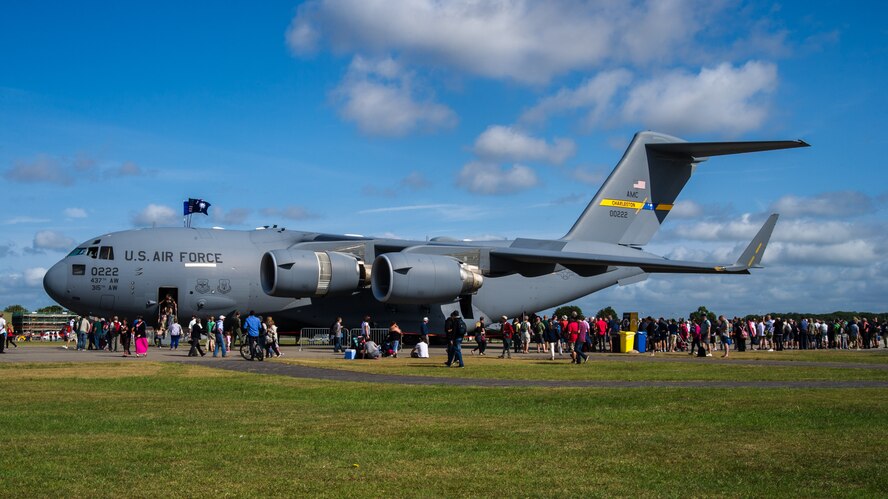 Air-show visitors wait in line to get a tour of the Charleston based C-17 at Royal Naval Air Station Yeovilton International Air Day July 11, 2015. Recognized for “Best Static Display” at the air show, Airmen from the 315th Airlift Wing at Joint Base Charleston, S.C. delivered military pride, strength and technology with a C-17 and gave tours of the aircraft to more than 2,000 people. The air show marked 75 years of existence for RNAS Yeovilton and provided the 315th AW an international stage to showcase its Airmen, aircraft and partnership with the United Kingdom. (U.S. Air Force photo by Tech. Sgt. Shane Ellis)
