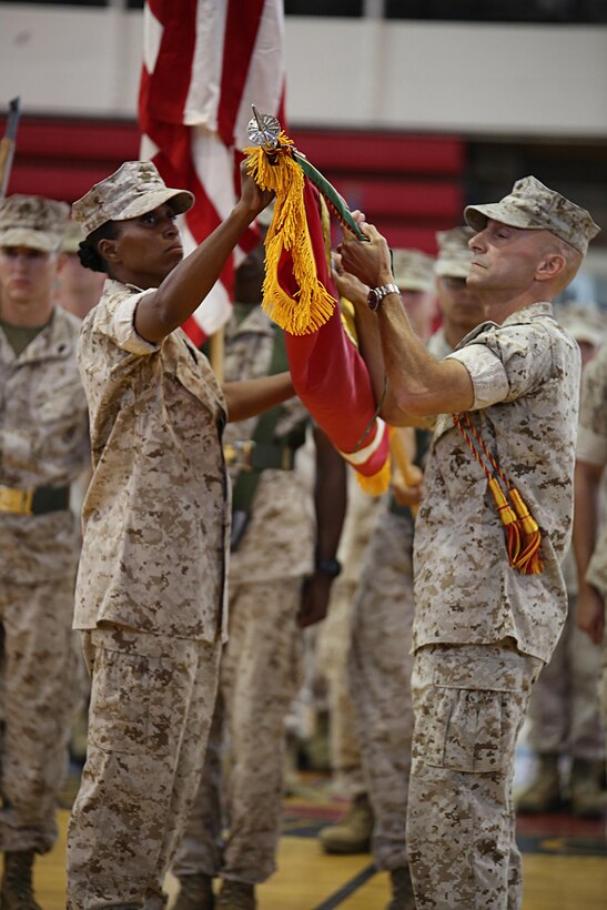 Sgt. Maj. Robin C. Fortner, left, Ground Combat Element Integrated Task Force Sergeant Major, and Col. Matthew G. St. Clair, GCEITF Commanding Officer, case the Task Force colors during the unit’s deactivation ceremony at the Goettge Memorial Field House, Marine Corps Base Camp Lejeune, North Carolina, July 14, 2015. From October 2014 to July 2015, the GCEITF conducted individual and collective level skills training in designated ground combat arms occupational specialties in order to facilitate the standards-based assessment of the physical performance of Marines in a simulated operating environment performing specific ground combat arms tasks. (U.S. Marine Corps photo by Sgt. Alicia R. Leaders/Released)