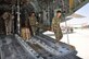 Two Afghan National Army flight medics carry a litter, or stretcher, from the back of a C-130H Hercules during a simulated medical evacuation flight at Hamid Karzai International Airport, Afghanistan, July 9, 2015. The Train, Advise, Assist Command - Air (TAAC-Air) advisors provide weekly training to the ANA and Afghan air force to further develop and grow their fight medics’ capabilities. (U.S. Air Force photo/Capt. Eydie Sakura)