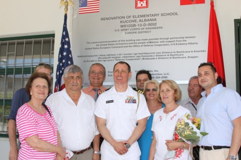 American and Albanian partners gather June 11 to celebrate the reopening of a local school in Kucove, Albania. U.S. Army Corps of Engineers Europe District managed a $575,000 renovation in support of U.S. Embassy Tirana's Office of Defense Cooperation...