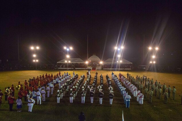 The U.S. Marine Corps Forces, Pacific Band performs alongside Tonga's Royal Corps of Musicians, the Australian Army Band, the New Zealand Army Band and various Tonga high school bands in a military tattoo in Nuku’alofa, Tonga, July 8, 2015. The U.S. and Tonga have sustained strong partnerships for years that continue to improve through participation in cultural events, such as the King’s coronation. (U.S. Marine Corps photo by Cpl. Brittney Vito/Released)