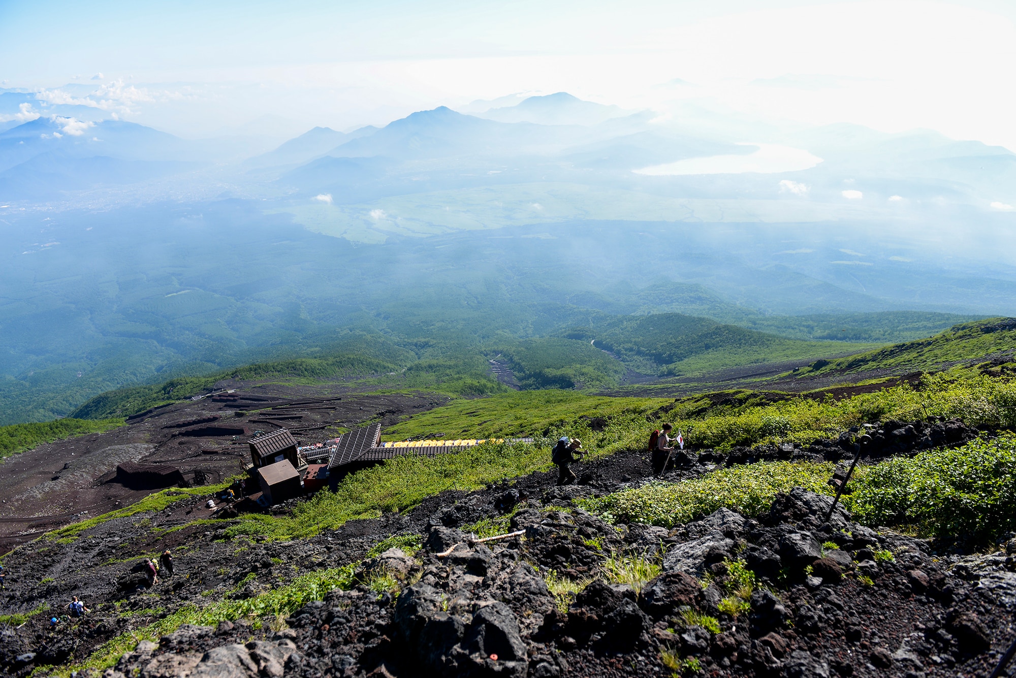 Hikers make their way up the Yoshida trail on their way to the summit of Mount Fuji, Japan, July 11, 2015. Airmen from Yokota Air Base used teamwork and resiliency to make sure that all members returned safely from the mountain. (U.S. Air Force photo/Airman 1st Class Elizabeth Baker)