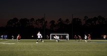 Airmen from the 823rd Red Horse Squadron, the 1st Special Operations Component Maintenance Squadron and the 1st Special Operations Equipment Maintenance Squadron compete in an intramural soccer game on Hurlburt Field, Fla., July 13, 2015. The 823rd RHS and the joint 1st Special Operations CMS/EMS tied 2-2 after one overtime round in the 2nd week of league play. There are 15 squadrons participating this season and regular season play is scheduled to last until Aug. 13 2015. (U.S. Air Force photo by Airman Kai White/Released)