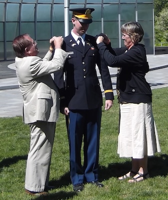 in May upon his graduation from the U.S. Army Military Academy at West Point, 2nd Lt. Matthew Shoenberger was pinned by his mother, ERDC Statistician Tere DeMoss, and former ERDC liaison to West Point Dr. Paul Mlakar.