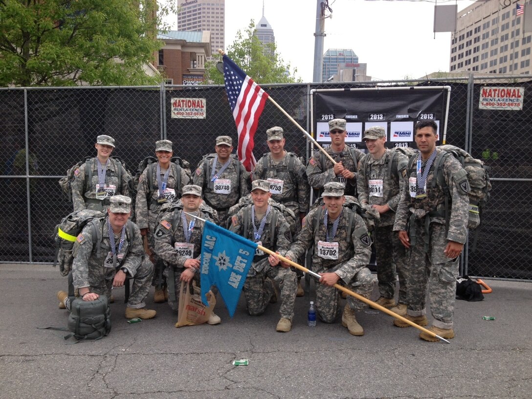 Nine soldiers from Detachment 5, European Command, Joint Analysis Center, United States Army Reserve Element, along with two Reserve Officer Training Corps cadets, complete the OneAmerica Mini-Marathon to raise $4,420.00 for the Wounded Warrior Project (Courtesy photo)