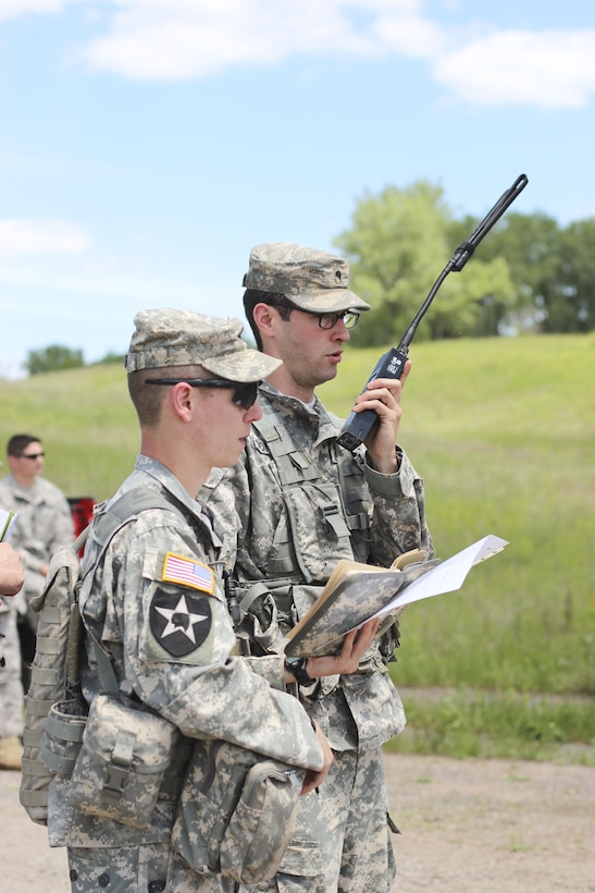 Spc. Joseph Donahue, calls for direct file during the 319th Psychological Operations Company training event June 8, 2014. The company is out of Arden Hills, Minn. (U.S. Army photo by Staff Sgt. Sharilyn Wells/USACAPOC(A) PAO)