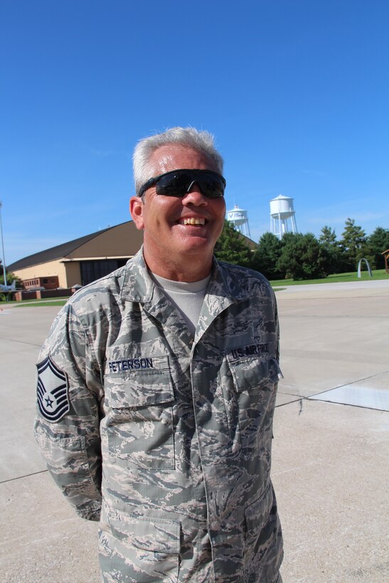 Senior Master Sgt. Ron Peterson, 932nd Airlift Wing Civil Engineer Squadron, helped to move distinguished visitor's luggage during the Air Force Reserve Command UEI event this week.  He and his team took care of loading, transporting and unloading of people and equipment to get everyone and everything to their proper places before take off.  (U.S. Air Force photo/Maj. Stan Paregien)