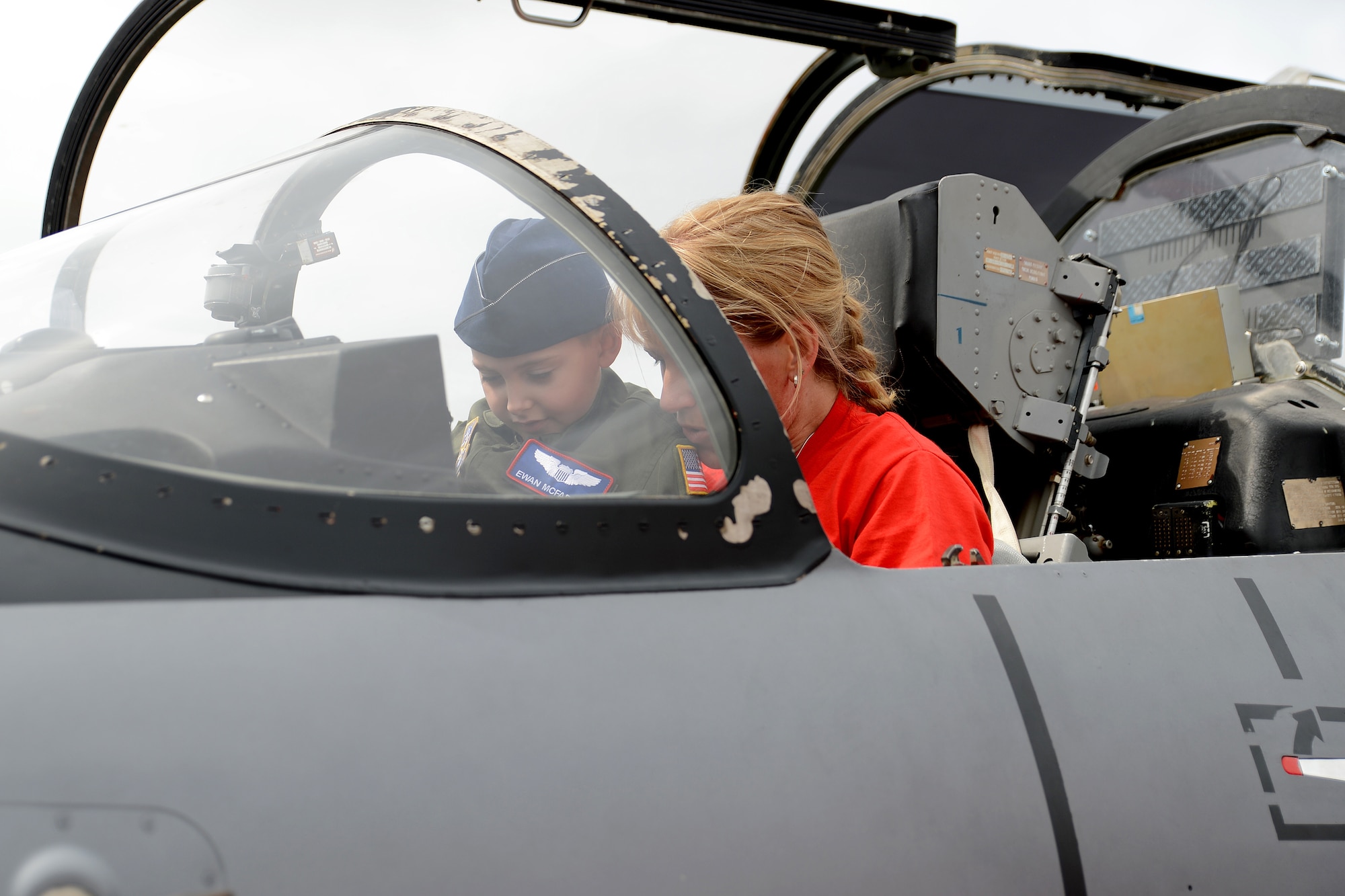 Ewan McFadgen, Pilot for a Day, and his mother Melissa, look at the controls of an Aero L-39 Albatros July 10, 2015, during his tour of Joint Base Lewis-McChord, Wash. During his time on McChord Field, McFadgen visited some of the squadrons here such as the 4th Airlift Squadron, 627th Civil Engineer Squadron and 22nd Special Tactics Squadron.