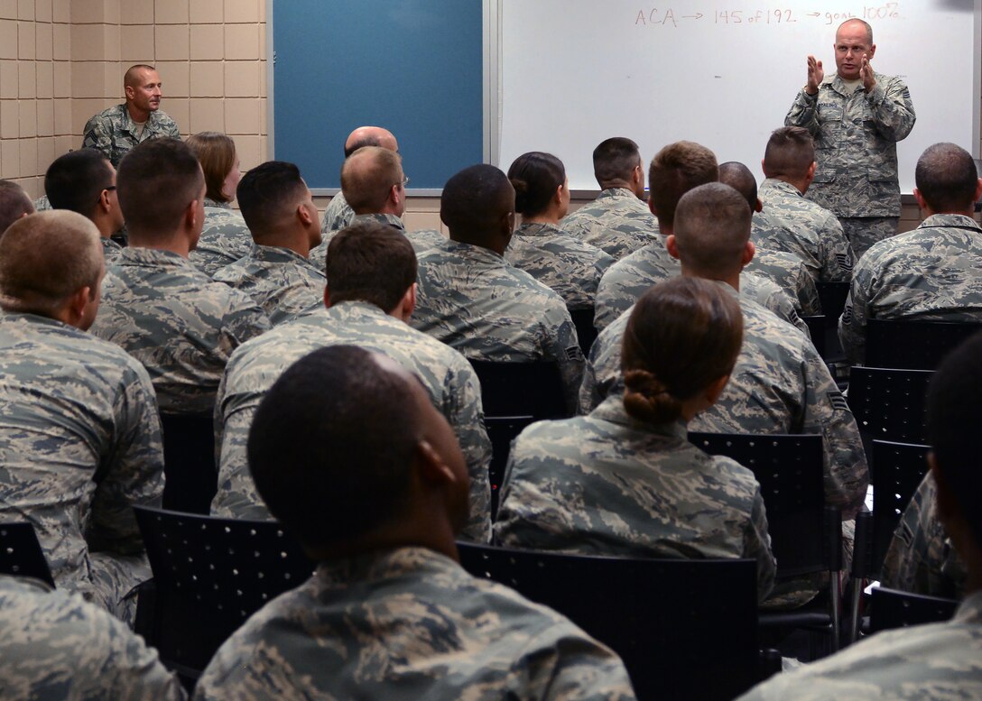 U.S. Air Force Chief Master Sgt. James W. Hotaling, Command Chief Master Sgt. of the Air National Guard speaks to the members of the 202nd Red Horse Squadron at Camp Blanding Joint Training Center, Starke Fla. on July 11, 2015. Chief Hotaling relayed the vision of the Director of the Air National Guard, Lt. Gen. Stanley E. Clarke III, to the 202nd members and provided a feedback opportunity to them so they may voice questions and concerns. (U.S. Air Force photo by Amn. Nietza Reynolds // RELEASED)