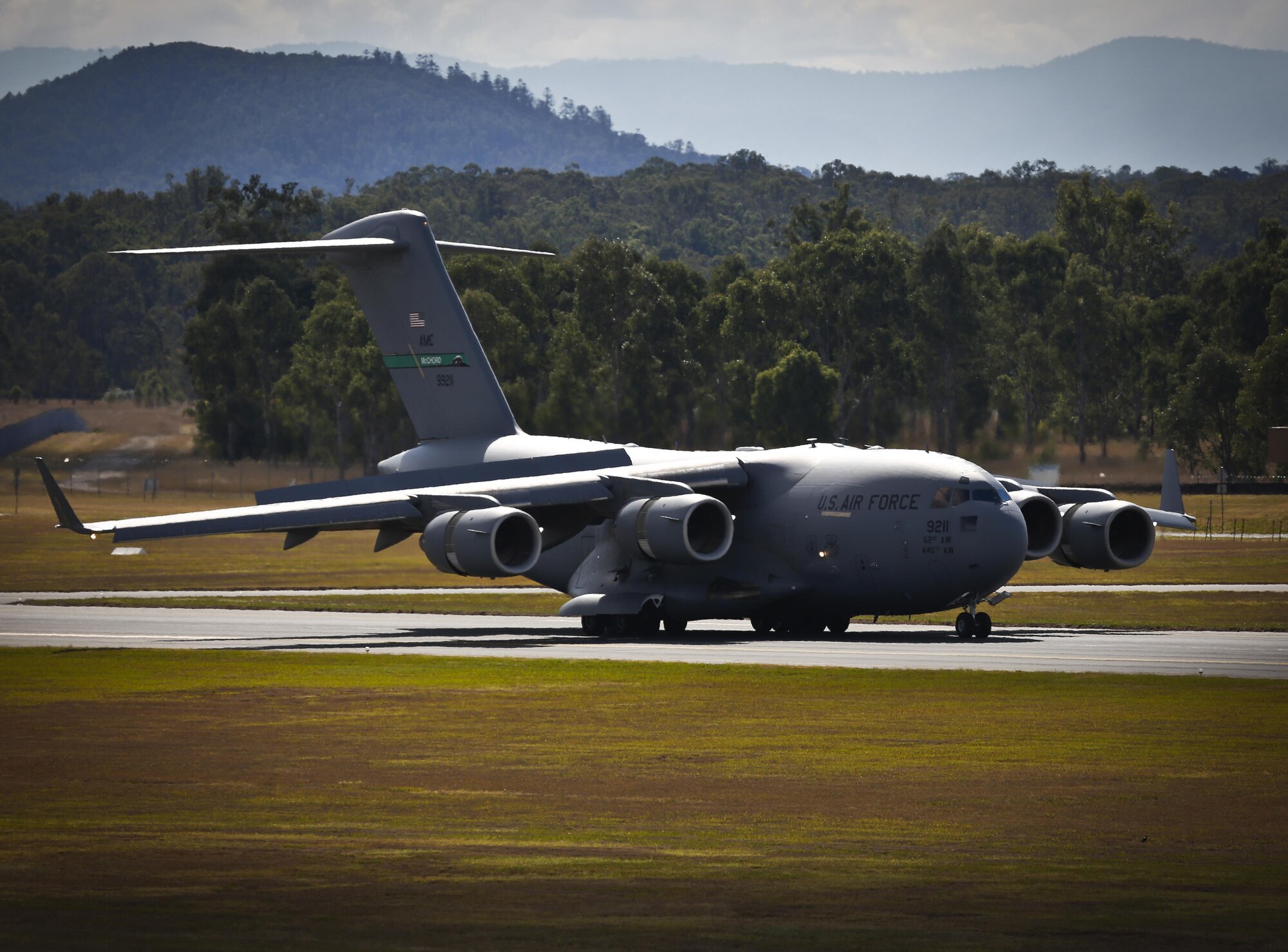 A U.S. Air Force C-17A Globemaster III taxis back to Royal Australian Air Force Base Amberley, Australia, after completing the airborne insertion with the RAAF and U.S. Army to the Shoalwater Bay Training Area, Australia, July 8, 2015. The C-17AGlobemaster III is from the 62nd Airlift Wing, Joint Base Lewis-McChord, Washington.  (Royal Australian Air Force photo by Cpl. Shannon McCarthy/Released) 