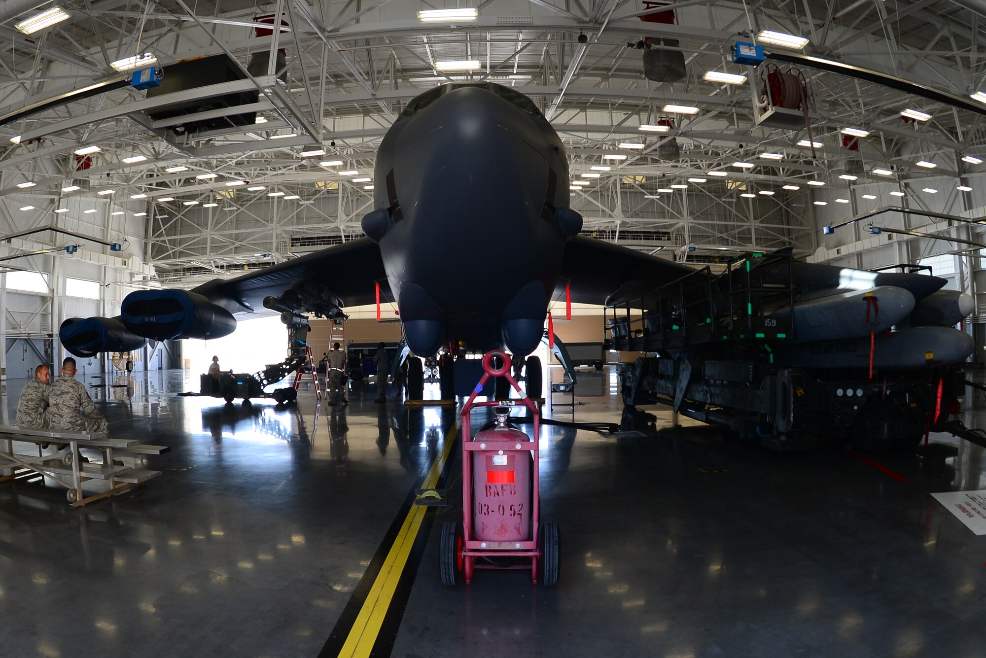 The 2nd Maintenance Group had a load crew of the quarter competition in the weapons load training facility at Barksdale Air Force Base, La., July 10, 2015. The competition was to see which team could inspect, prepare and load weapons onto a B-52 Stratofortress the quickest and with the least amount of discrepancies. (U.S. Air Force photo/Airman 1st Class Luke Hill)