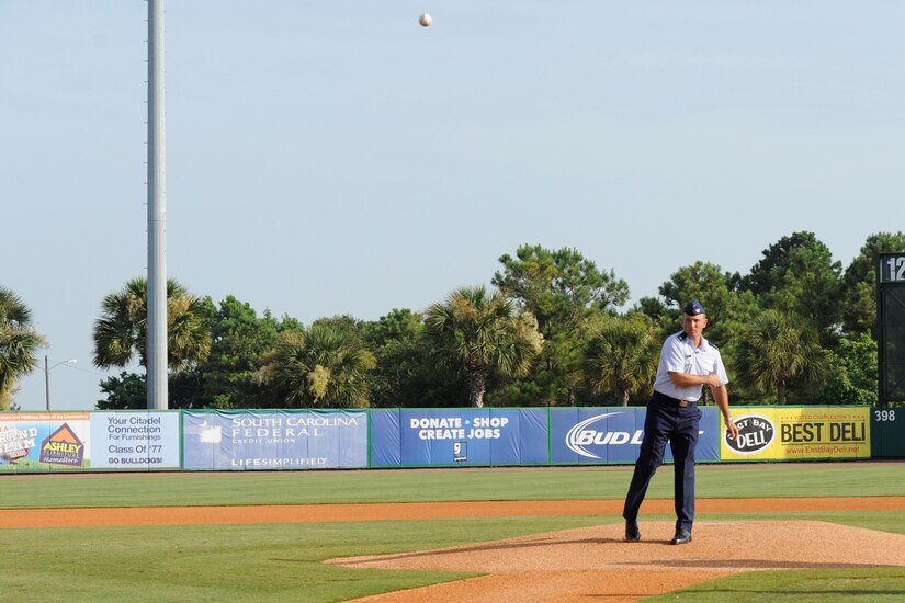 Col. John D. Lamontagne, 437th Airlift Wing commander, delivers the ceremonial first pitch during Military Appreciation Night July 11, 2015, at Joseph P. Riley Jr. ballpark in Charleston, S.C. The Charleston RiverDogs hosted Military Appreciation Night to show their support for the local military. (U.S. Air Force photo/ Staff Sgt. William A. O’Brien)